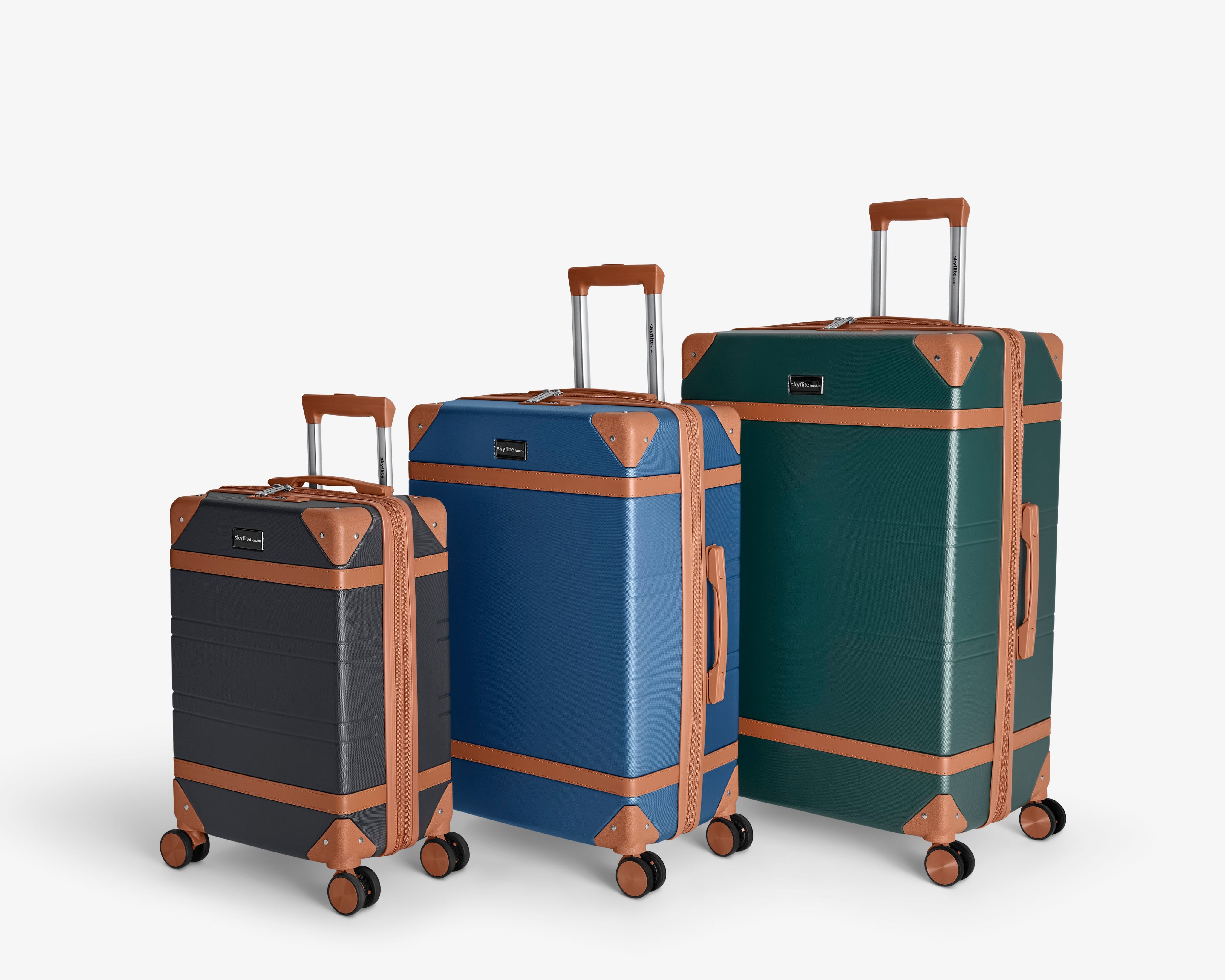 Three-piece Skyflite Retro luggage set with durable, hard-shell trolley cases in black, cream, and light blue, arranged by size.