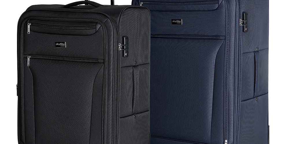 The Skyflite Continental lightweight soft luggage collection, showing three black trolley cases in small, medium, and extra-large sizes.