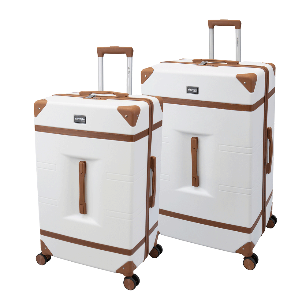 Skyflite Retro Trunk 2-piece hardshell luggage set in classic ivory, featuring a large suitcase and a matching smaller carry-on standing side-by-side.